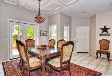 Formal dining room with custom ceiling appointment