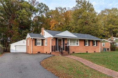 Large paved driveway and custom brick sidewalk