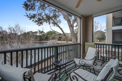 Screened-in porch overlooking the pond