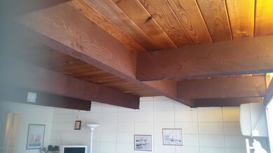 Wood and beamed ceiling