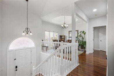 Entryway featuring baseboards, recessed lighting, 