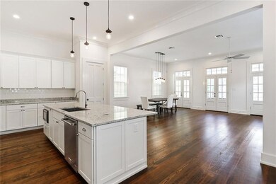 KITCHEN -- OPEN TO LIVING AND DINING ROOM