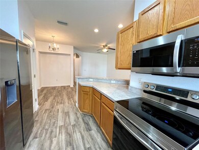 9904 Venetian River Way, Tampa, FL 33619 - photo 7