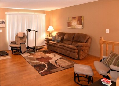 Big living area with laminate flooring throughout