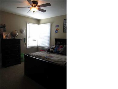 GUEST BEDROOM IS NICELY SIZED WITH OVERSIZE CLOSET