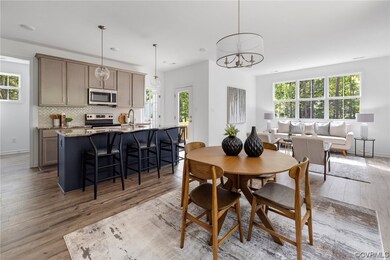 Dining room with a wealth of natural light and lig