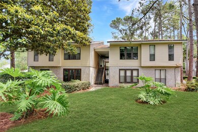 Ground floor condo on right