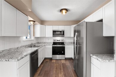 All new cabinets, stainless appliances sure to please all who gather here