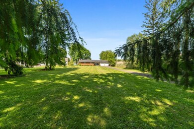 .88 Acre, sits back from the road