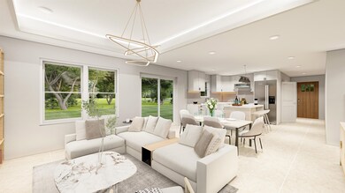 Living room with light tile patterned floors and a notable chandelier