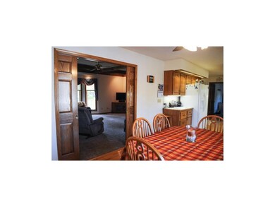 Breakfast Room Looks Into Great Room