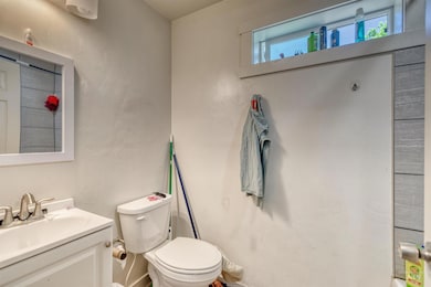 Bathroom with vanity and toilet