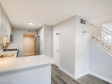 Remodeled kitchen with gorgeous quartz countertops