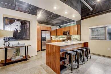 Kitchen with stainless steel appliances, brown ca