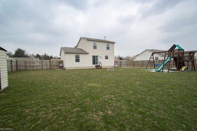 Large fenced in backyard. Swing set comes with the