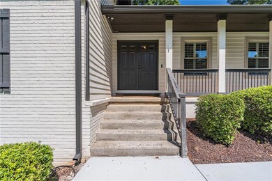 Property entrance featuring covered porch