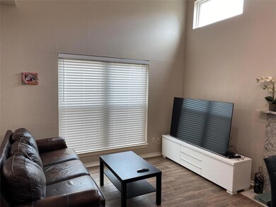 Living room featuring hardwood / wood-style floors