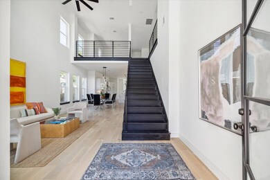 This is a spacious, modern interior with high ceil