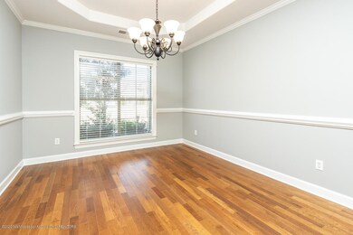 Dining features tray ceiling too
