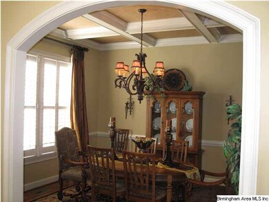 dining room with coffered ceiling