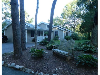 Exterior Front. Beautifully Landscaped Yard (view