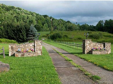 Land/Lot. Driveway entrance from Route 305.