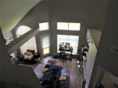 View of Living Room and Dining Room from Loft