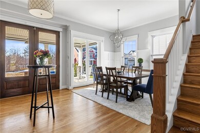 Dining space featuring french doors, light wood-ty