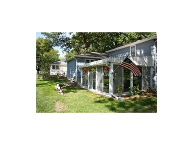 Enclosed patio overlooks huge backyard
