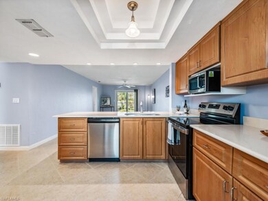 Kitchen featuring pendant lighting, sink, stainles