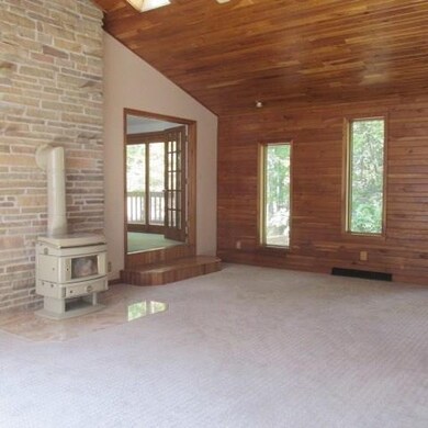 The 24x17 Family Room boasts a wood-burning stove,