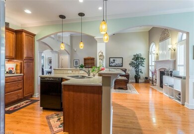 Hardwoods grace most of the interior rooms. Pendant lights and under cabinet lightings. Solid surface counters and pretty tile backsplash.