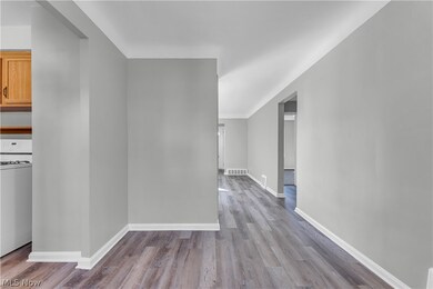 Unfurnished room featuring light hardwood / wood-style floors