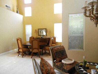 Living Room. Dining room towards living room. Warm