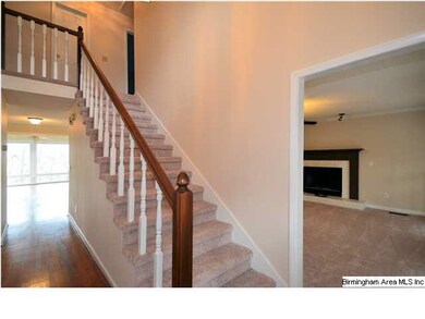 Foyer with staircase leading to 4 big bedrooms