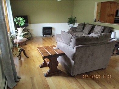 LIVING ROOM WITH NEW HARD WOOD OAK FLOORS