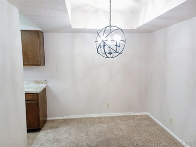 Breakfast nook off kitchen.