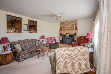 Living room with Buck stove insert