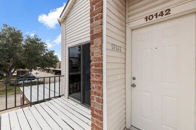 Front entry to updated home and balcony.