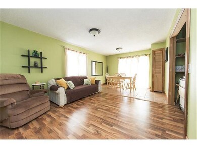 Spacious upper level family room with 3 more bedro