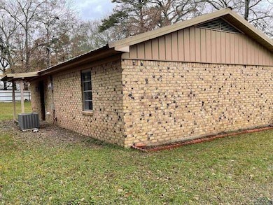 View of property exterior featuring cooling unit a