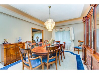 Formal dining room has been freshly painted and ca