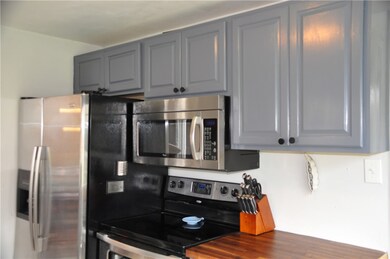 Shiny stainless steel appliances remain.