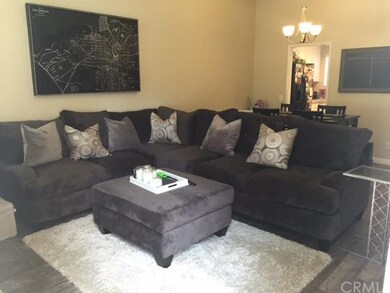 Living room in open, flowing space.  Light and bri