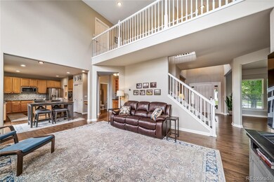 View of the family room and the wrap around hallway upstairs