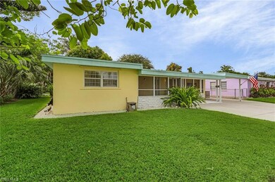 View of front of property featuring a front lawn