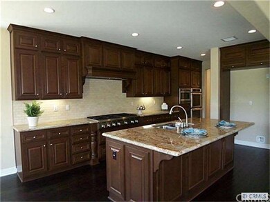 Rich Cabinetry & Granite Countertops