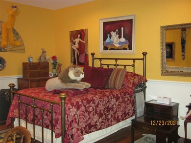 Primary bedroom is to the left of the entry.  Both