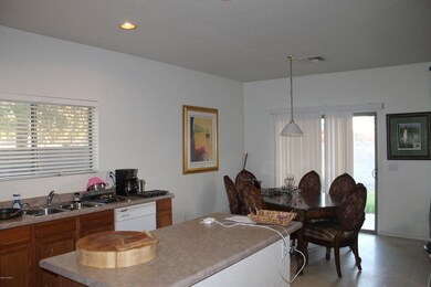 kitchen island bar & dining area