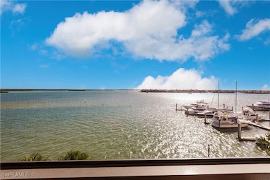 View of water feature featuring a dock